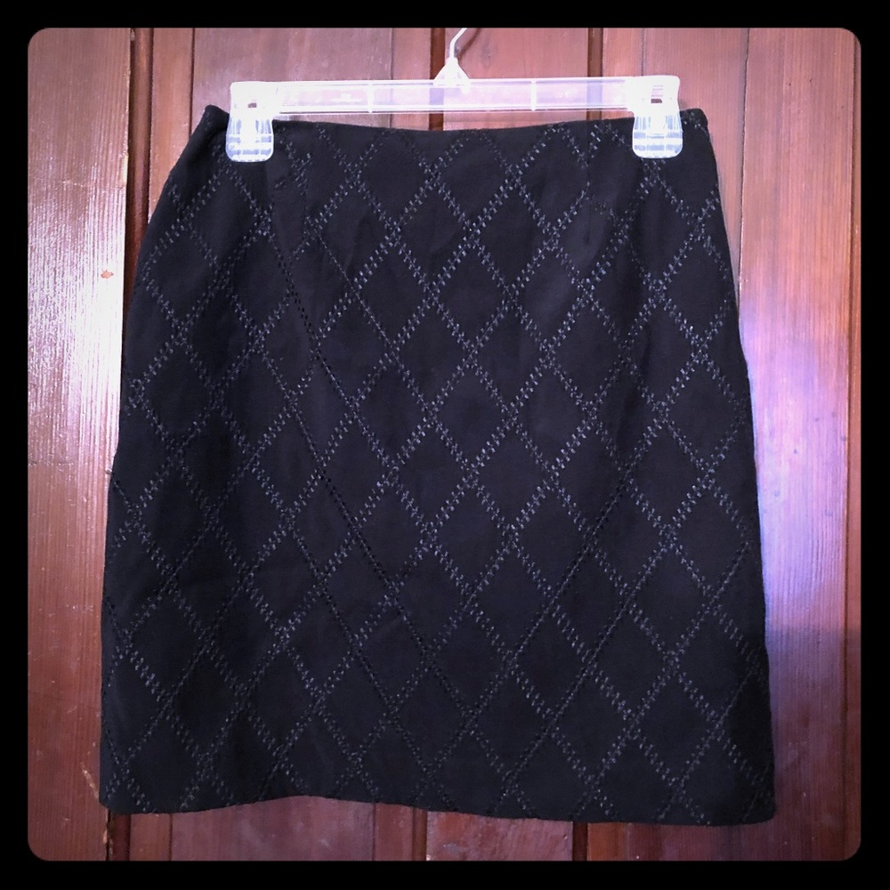 Petite Sophisticate black mini skirt.